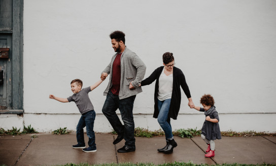 family of four walking at the street 2253879