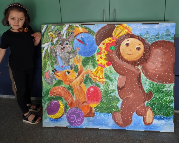 Russian playgroup weaves Christmas traditions into summer fun at holiday party.