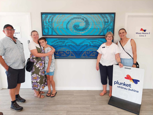 Retiring Plunket nurse Claire Henderson with her family. (Left to right) Gary Henderson, Sarah Paterson, Quinn Paterson, Claire Henderson and Aleisha Thompson
