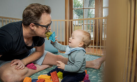 Child Development 4 to 12 months Dad and baby