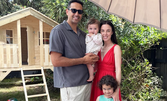 Wiremu Adds and whānau standing in their garden